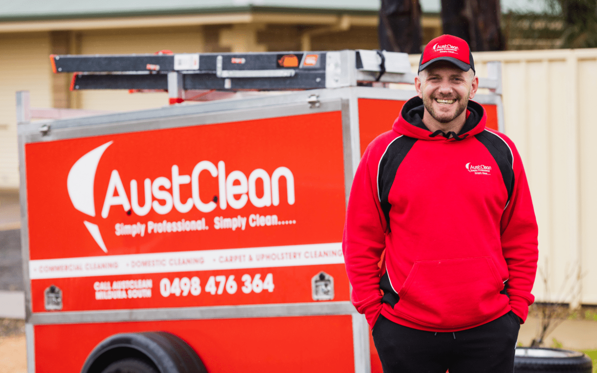 Franchise Opportunities 13 AustClean franchise owner with branded trailer and equipment – mobile cleaning business franchise opportunity in Australia.